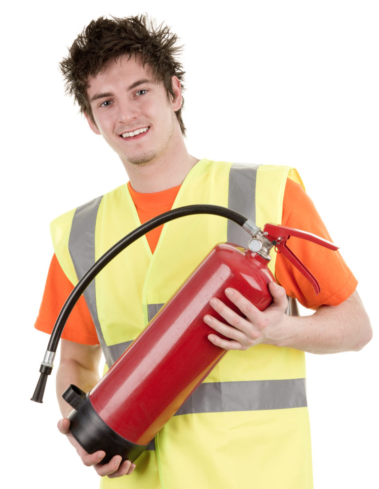 Fire Marshal in tabard with extinguisher