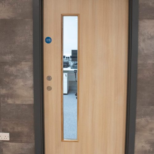 Picture of a fire door with vision panel